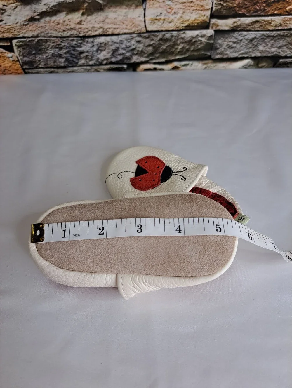 Baby White Leather Slip-On Shoes with Red Ladybug Detail